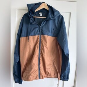 New Tilly’s Independent Men’s Medium wind breaker jacket, navy blue tan brown